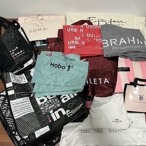 Great bundle of Reusable shop designer bags great condition with minor creasing